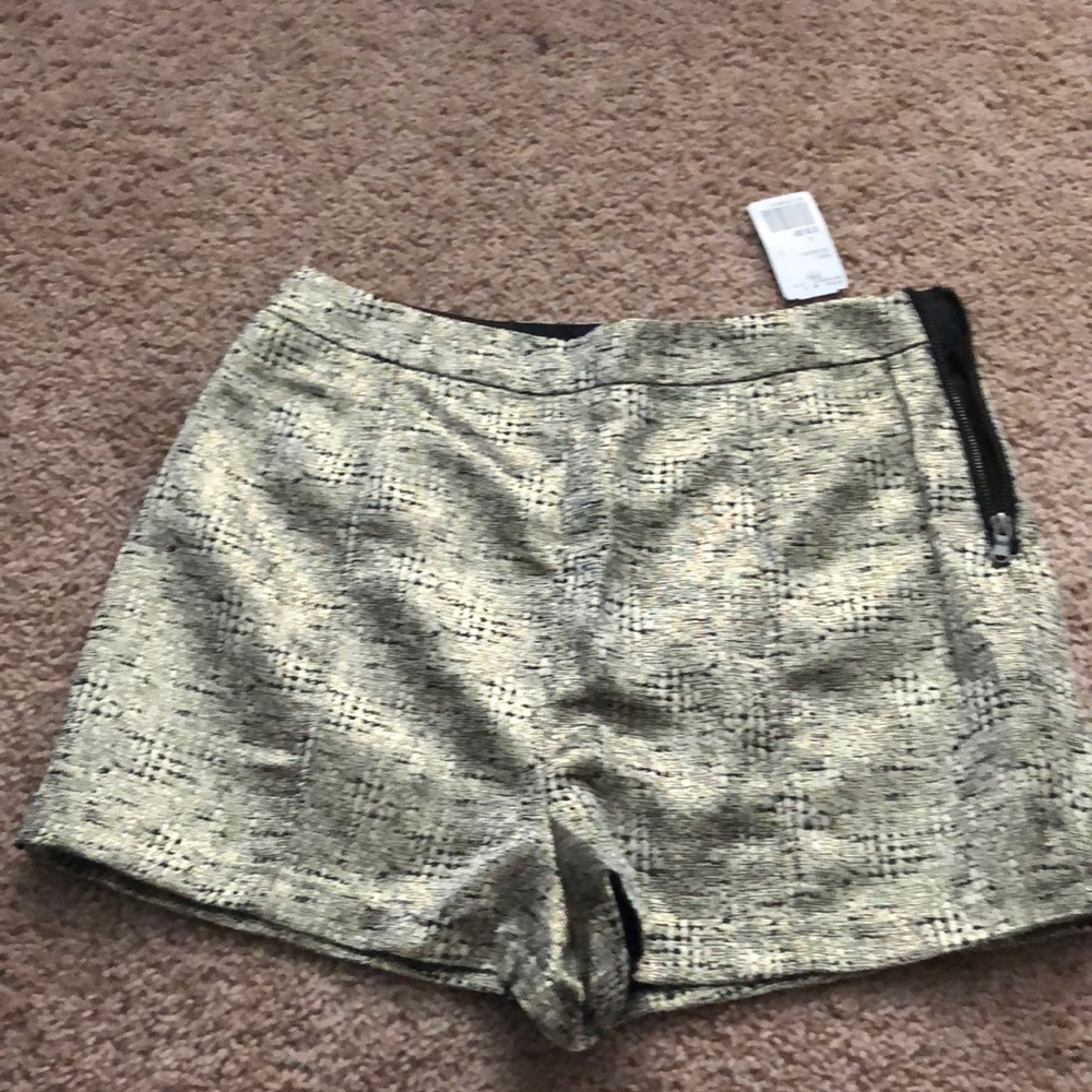 High waisted gold and black shorts